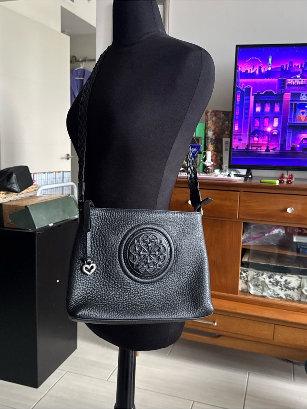 Brighton Black Leather Crossbody Bag with Embossed Medallion